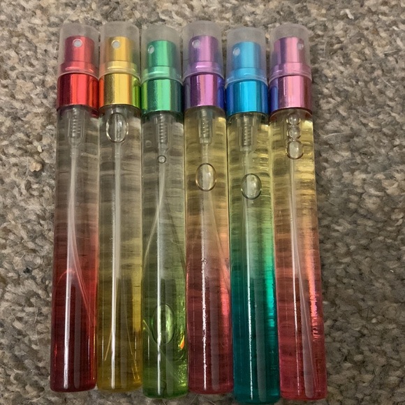 4 FOR $8 !!! Fresh baby powder scented spray on body oil. 💨 - Picture 3 of 4